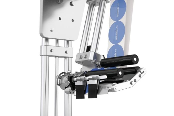 Dispense or deflect custom-fit labels from MULTIVAC