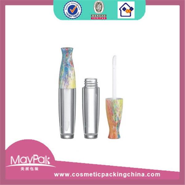 Cylinder lipgloss container with brush